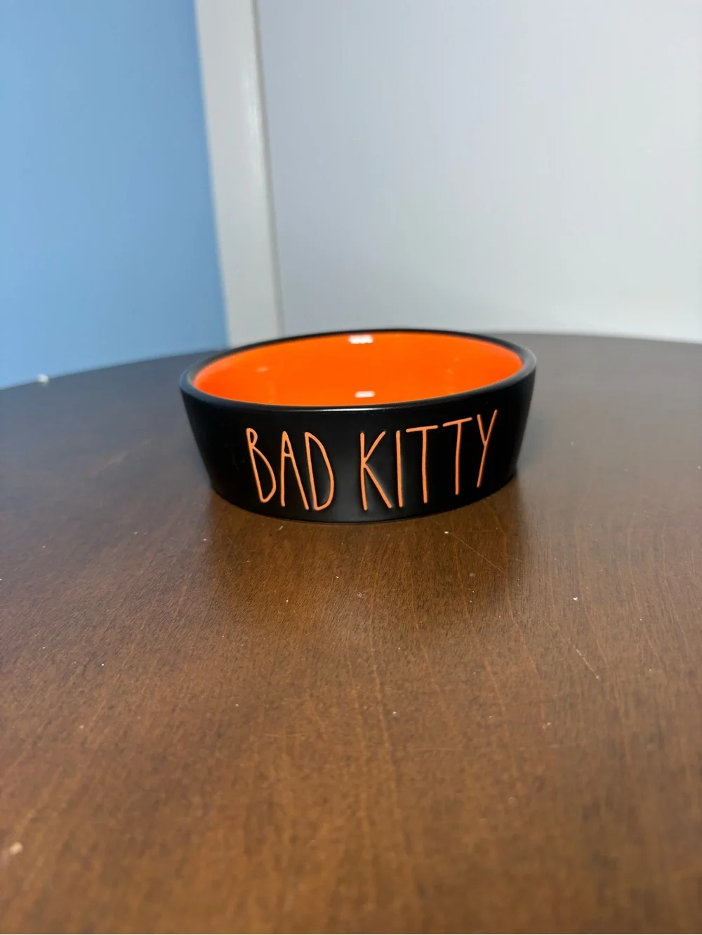 Rae Dunn Black Ceramic Pet Bowl with Bright Orange Interior